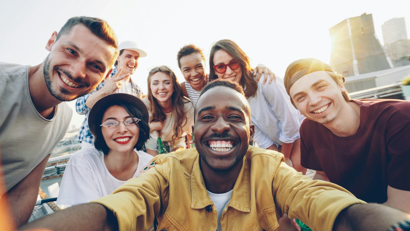A diverse group of friends celebrating together